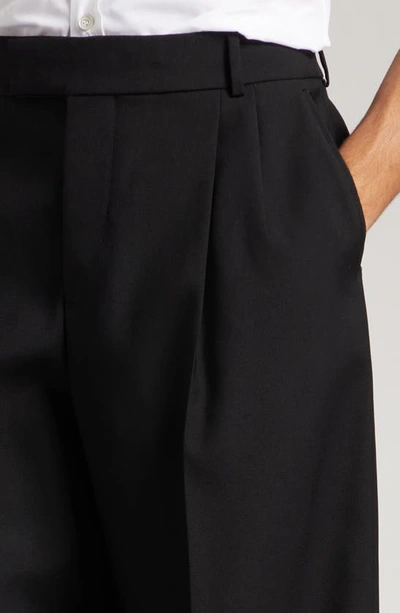 Shop Alexander Mcqueen Oversize Pleated Baggy Wool Trousers In Black