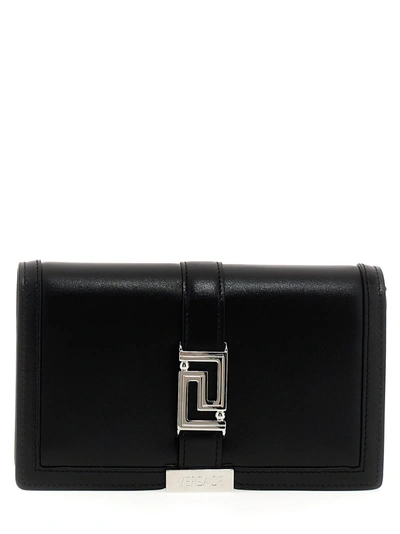 Shop Versace Mini Greca Goddess Clutch In Black