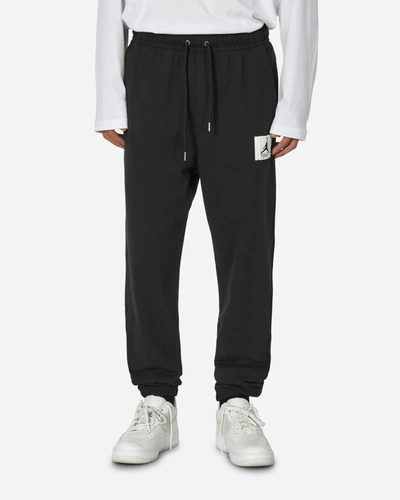 Shop Nike Flight Essentials Fleece Pants Black / Sail In Multicolor