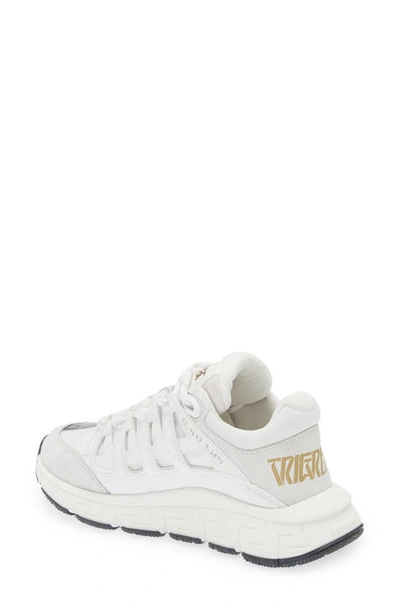 Shop Versace Kids' Trigreca Sneaker In White