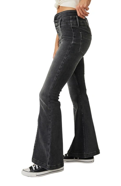 Shop Free People After Dark Exposed Button Mid Rise Flare Jeans In Vintage Black