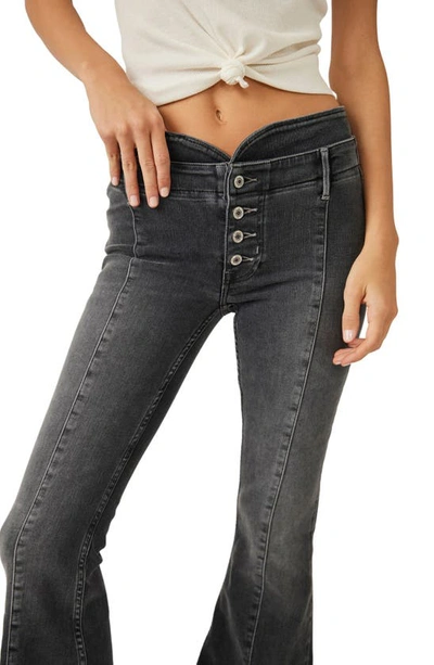Shop Free People After Dark Exposed Button Mid Rise Flare Jeans In Vintage Black