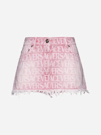 Shop Versace Logo Denim Miniskirt In Flamingo Pink