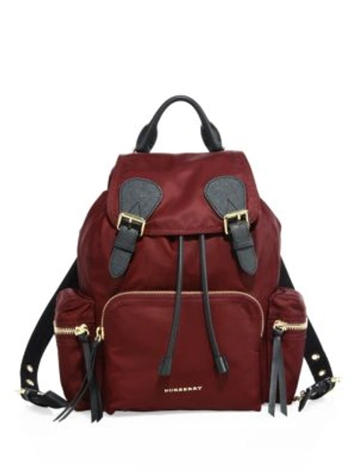 Shop Burberry Medium Nylon Rucksack In Burgundy