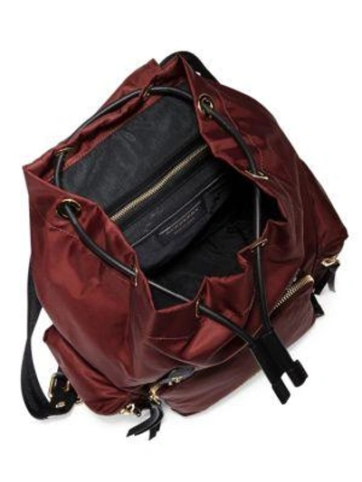 Shop Burberry Medium Nylon Rucksack In Burgundy