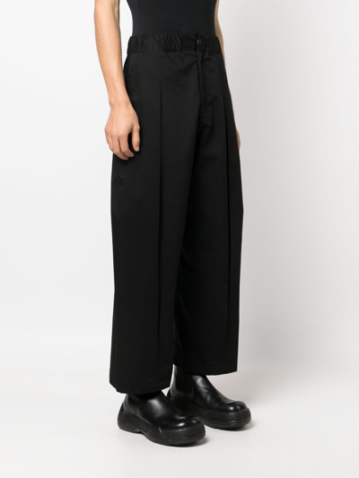 Sage Nation Box-pleat Wide-leg Trousers In Black