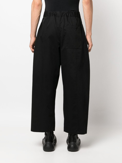 Shop Sage Nation Box-pleat Wide-leg Trousers In Black