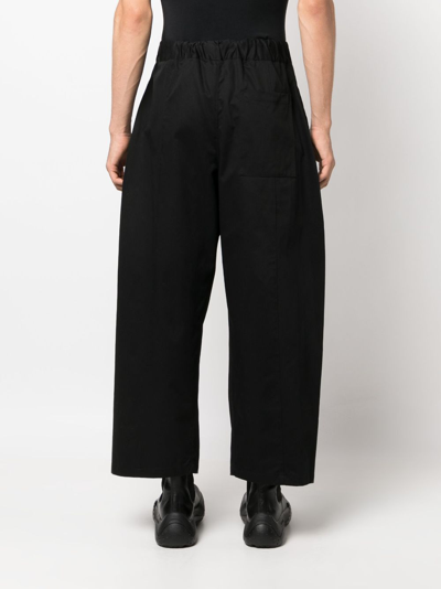 Sage Nation Box-pleat Wide-leg Trousers In Black