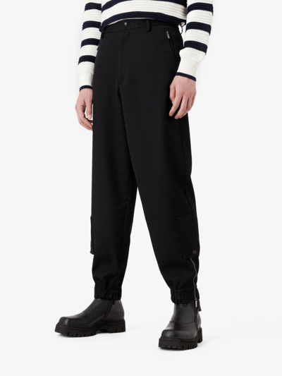 Shop Emporio Armani Ankle-zip Slim-cut Wool Trousers In Black