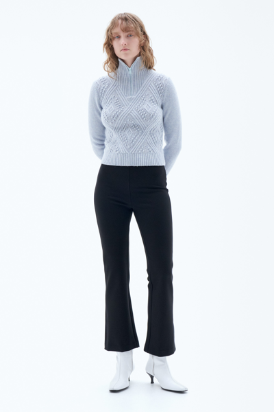 Shop Filippa K Flared Jersey Trousers In Black