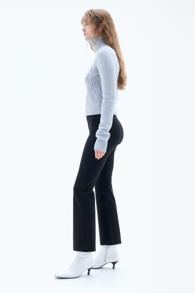 Shop Filippa K Flared Jersey Trousers In Black