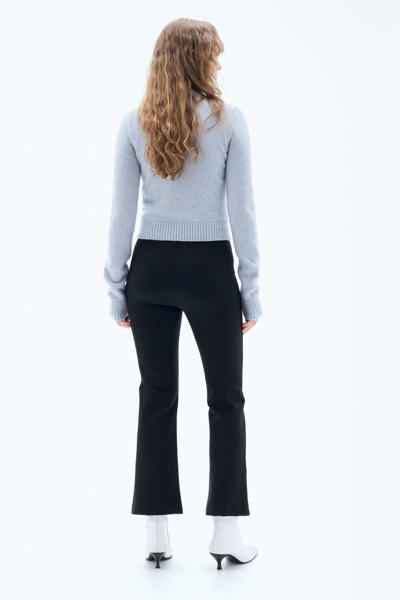 Shop Filippa K Flared Jersey Trousers In Black