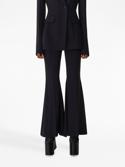 Shop Nina Ricci High-waist Flared Trousers In Schwarz