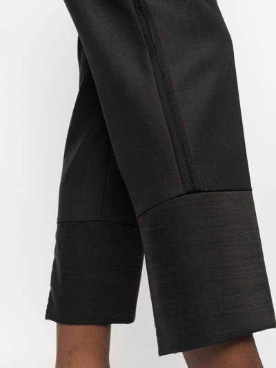 Shop Ibrigu Elasticated-waist Virgin Wool Cropped Trousers In Schwarz