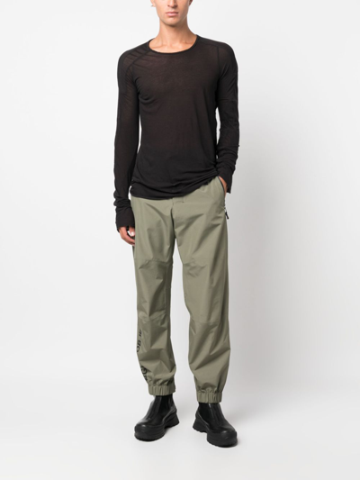 Shop Moncler Gore-tex® Tapered Trousers In Grün