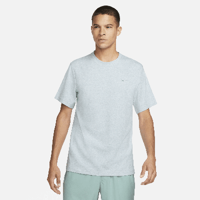 Shop Nike Men's Primary Dri-fit Short-sleeve Versatile Top In Green