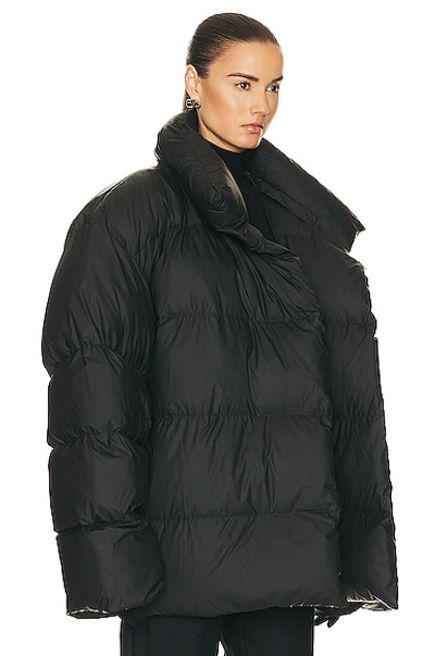 Shop Balenciaga Wrap Puffer Jacket In Black