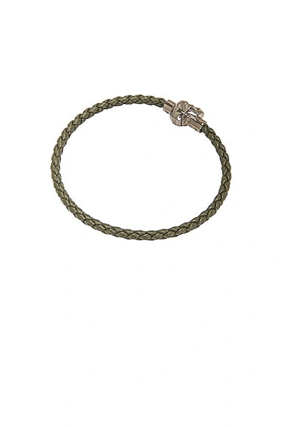 Shop Alexander Mcqueen Leather Cord Skull Bracelet In Military Green