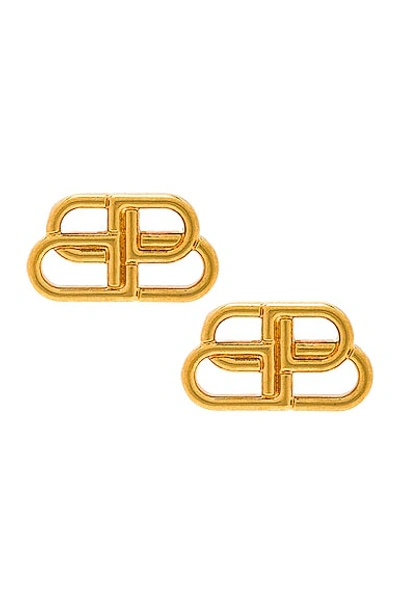 Shop Balenciaga Bb Stud Earrings In Gold