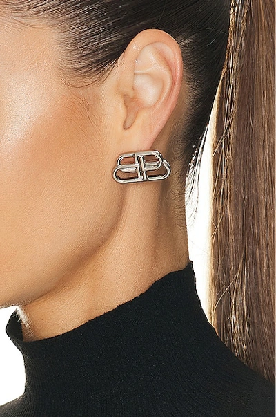 Shop Balenciaga Bb Stud Earrings In Silver