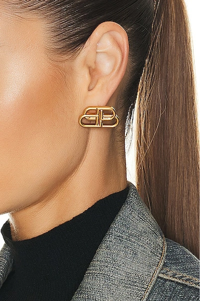 Shop Balenciaga Bb Stud Earrings In Gold