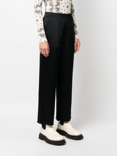 Shop Nanushka Elasticated-waist Cropped Trousers In Black