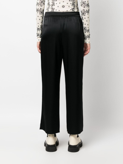 Shop Nanushka Elasticated-waist Cropped Trousers In Black