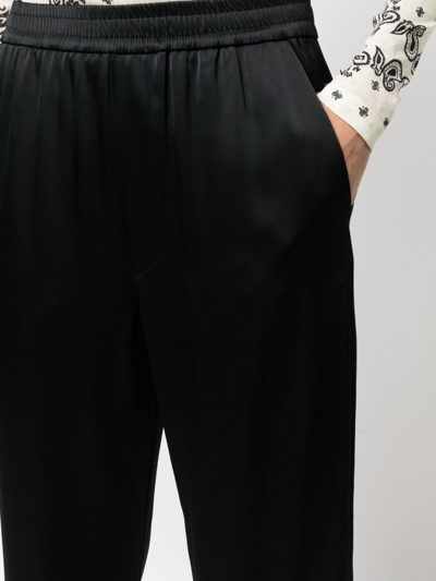 Shop Nanushka Elasticated-waist Cropped Trousers In Black