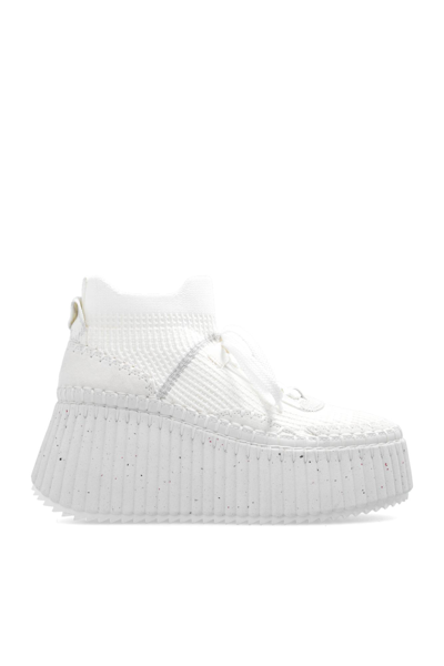 Shop Chloé Nama Wedge Sneakers In White