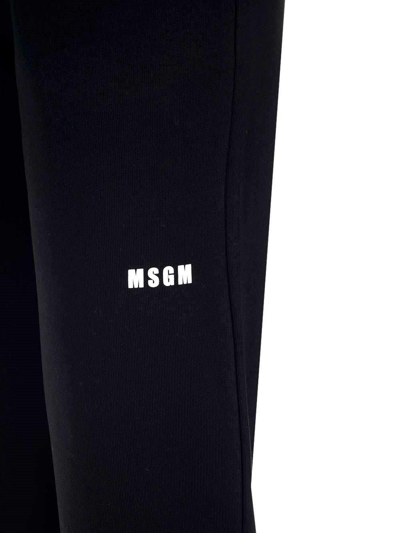 Shop Msgm Logo Printed Drawstring Pants In Black