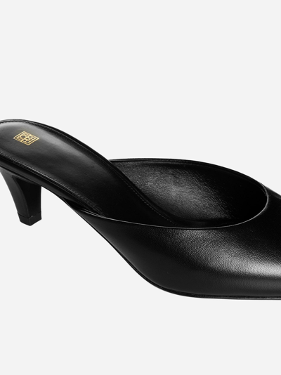 Shop Totême Leather Mules In Black