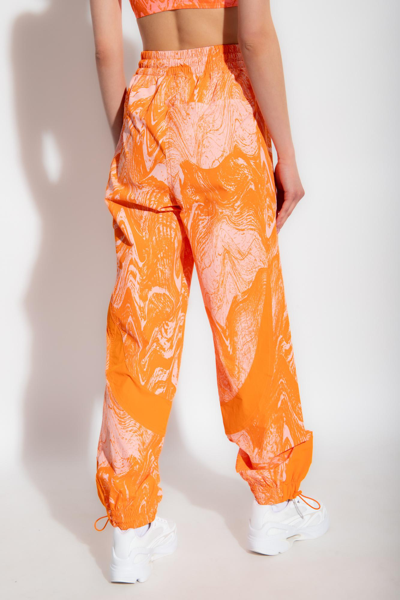Shop Adidas By Stella Mccartney Track Trousers With Logo In Light Flash Red/unity Orange