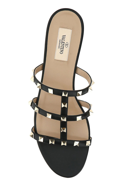 Shop Valentino Black Leather Rockstud Slippers In Nero