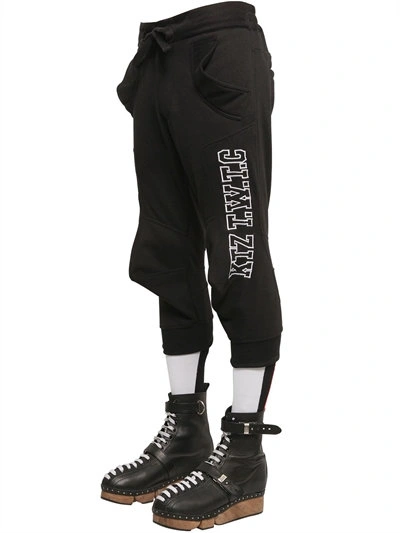 Shop Ktz Cropped Embroidered Cotton Jogging Pants In Black/white