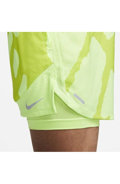 Shop Nike Dri-fit Stride Run Division Running Shorts In Ghost Green