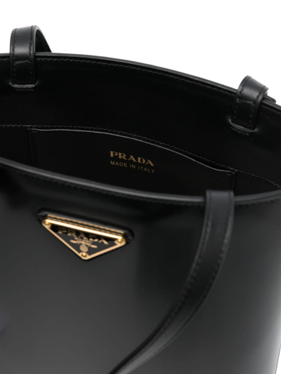 Prada Triangle Logo-plaque Bucket Bag In Black