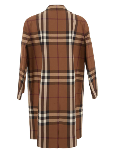 Shop Burberry Reversible Check Trench Coat In Beige