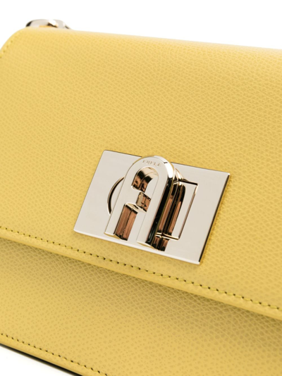 Shop Furla Logo-buckle Shoulder Bag In Yellow