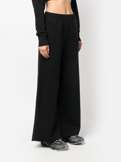 Shop Mm6 Maison Margiela Cotton Blend Wide-leg Trousers In Black