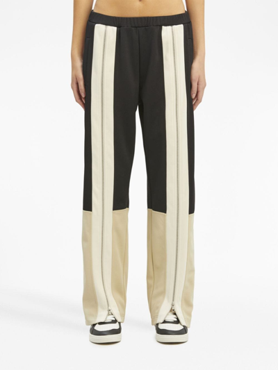 Shop Palm Angels Zipped Track Pants In Black