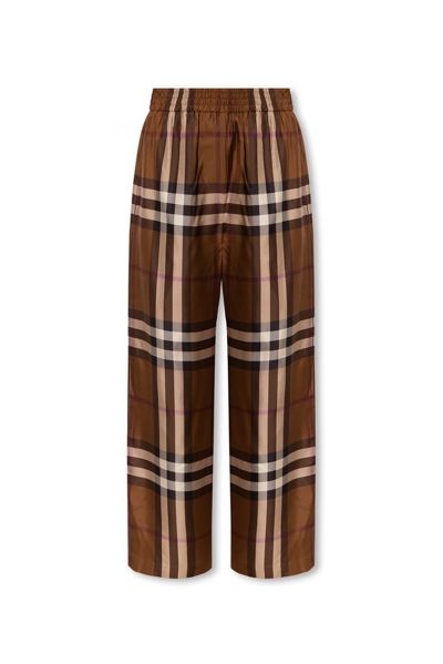 Shop Burberry Checked Elasticated Waistband Trousers In Brown