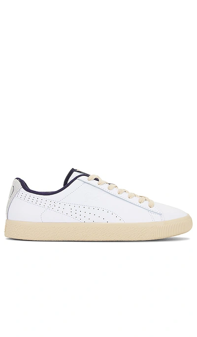 Shop Puma Clyde Baseline Sneaker In White