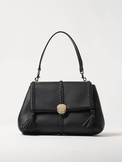 Shop Chloé Penelope Bag In Grained Leather In Black