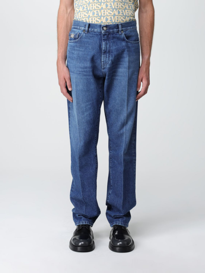 Shop Versace Denim Jeans With Logo Detail In Blue