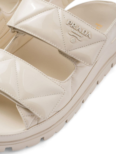 Shop Prada Logo-lettering Quilted Sandals In Nude