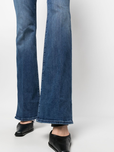 Shop Mother The Down Low Weekender Heel Bootcut Jeans In Blue