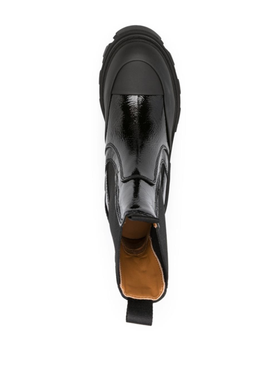 Shop Ganni Logo-embossed Panelled Ankle Boots In Schwarz