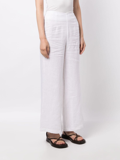 Shop Faithfull The Brand Ottavio Flared Linen Trousers In Weiss