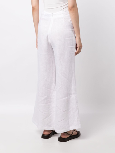 Shop Faithfull The Brand Ottavio Flared Linen Trousers In Weiss