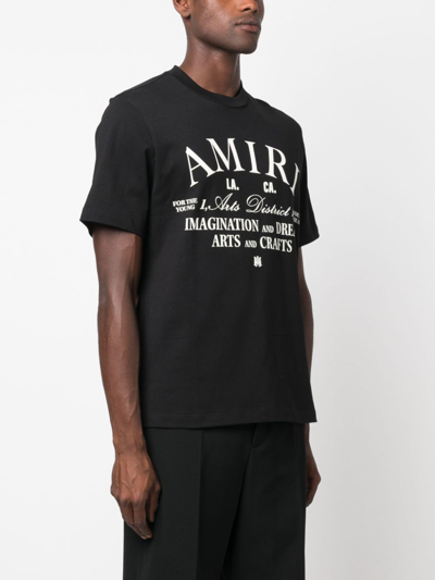 Shop Amiri Logo-print Cotton T-shirt In Schwarz